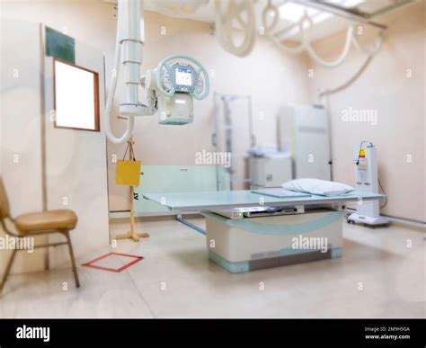 X-ray generator tube with monitor or X-ray general device with Bucky stand in radiology .modern ...