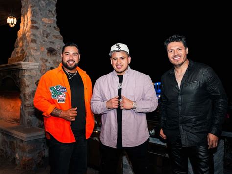 Download Fuerza Regida Members Night Out Wallpaper | Wallpapers.com