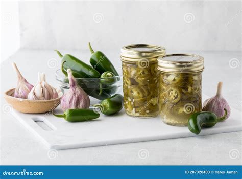 Homemade Jars of Sliced and Preserved Jalapeno Peppers. Stock Image ...