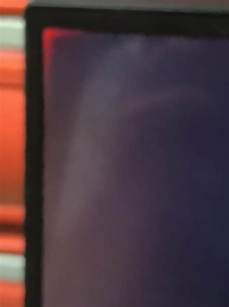 What's the cause of these red lights on each corners of my screen? Is there any way to fix it ...