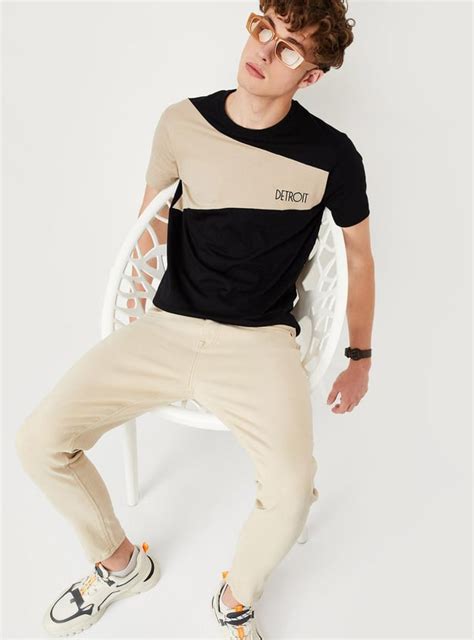 Buy Men Colourblocked Slim Fit T-shirt Online at just Rs. 599.0 ...