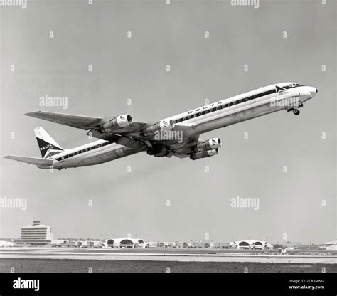 Take-off of a four-engine Douglas DC-8 airliner operated by Delta ...