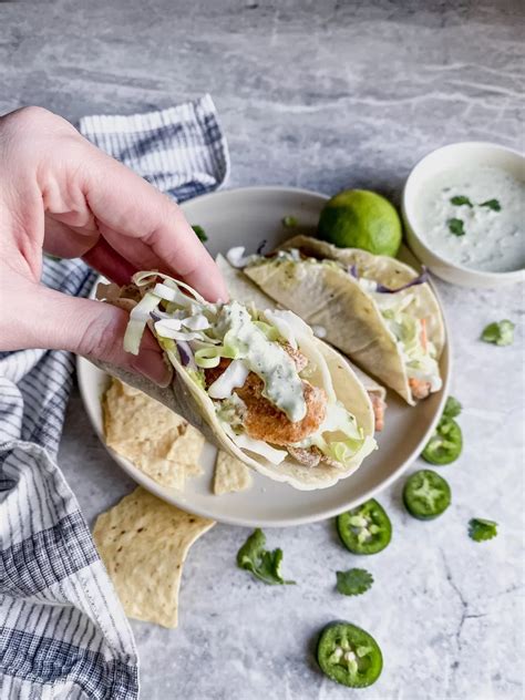 Fried Gluten Free Fish Tacos with Cilantro Lime Crema Sauce - Joanna Overly