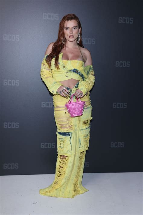 Hot sexy Bella Thorne slays in yellow frayed denim outfit - Celeblr