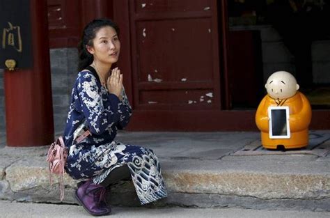 Buddhism goes tech-savvy: Meet Xian'er, Beijing's robot Monk who will ...