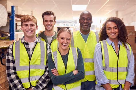 Premium Photo | Portrait Of MultiCultural Team Wearing HiVis Safety ...