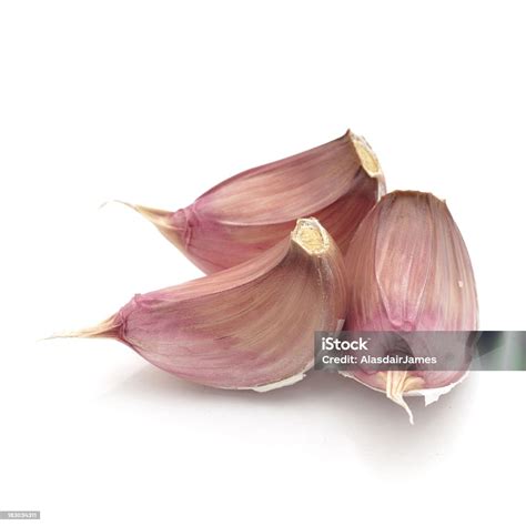Three Garlic Cloves Stock Photo - Download Image Now - Garlic, Garlic ...