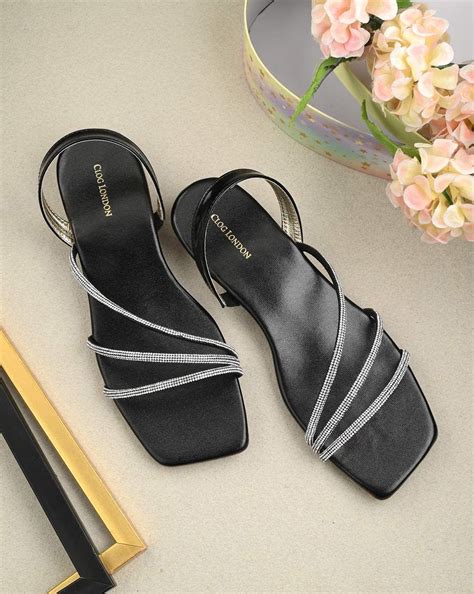 Sleek Black Charm Flats by Wyshlist