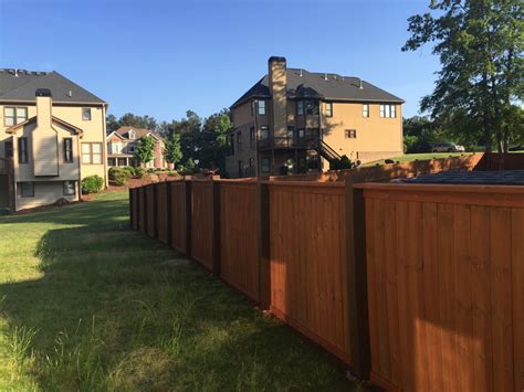 Top Tips for Staining and Sealing Outdoor Wood Fences