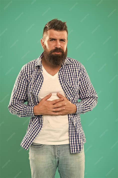 Premium Photo | See symptoms and aware yourself sick man suffer from stomach ache constipation ...