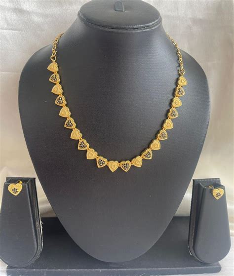 Gold tone cz black heart necklace set dj-43092 – dreamjwell