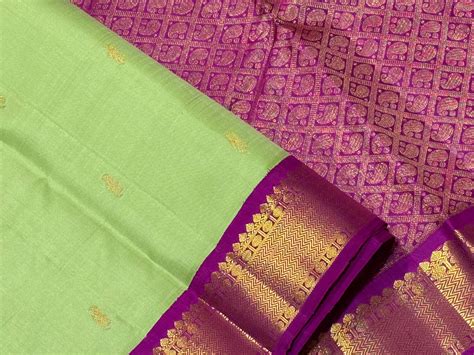 Gorgeous Pista Green with Vadamalli Purplish Pink Buttas Korvai Handwo ...