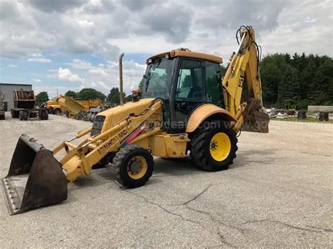 1999 Extendable Backhoe | AllSurplus