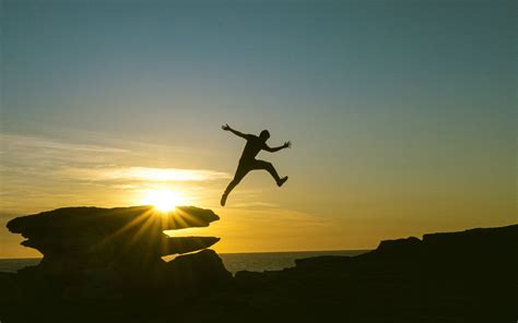 Download wallpaper 1920x1200 man, jump, rocks, sunset widescreen 16:10 ...