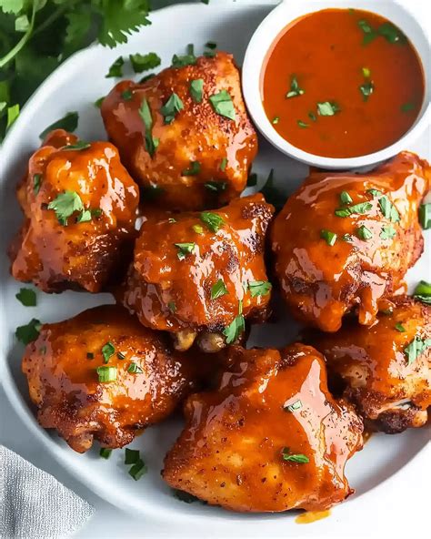 Spice Rubbed Buffalo Chicken Thighs Drizzled In Sauce to Delight ...