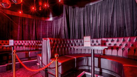 Download Red Room With Leather Couch Picture | Wallpapers.com