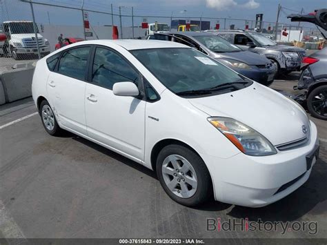 Report JTDKB20U677616868 TOYOTA PRIUS 2007 White Hybrid - price and damage history