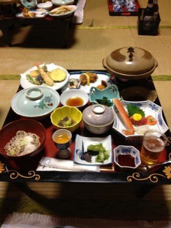 木彫りの弁天様が描かれた破風。 - Picture of Kokurakukan Togura Hotel, Chikuma ...