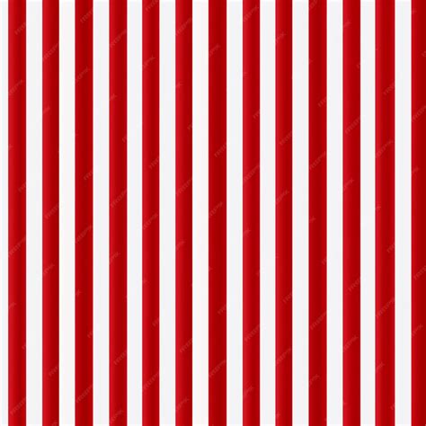 Premium Photo | A close up of a red and white striped background with ...
