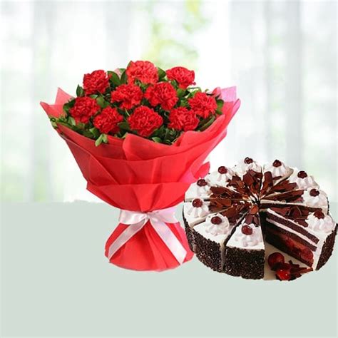 Send Bunch Of 10 Red Carnations With Half Kg Black Forest Cake Online ...