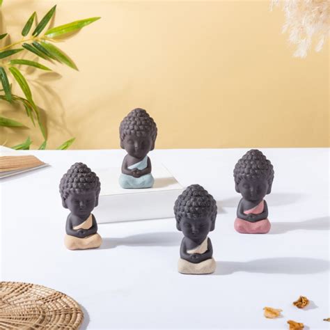 Monk Showpiece Set Of 4 Online - Premium Decor Object | Nestasia