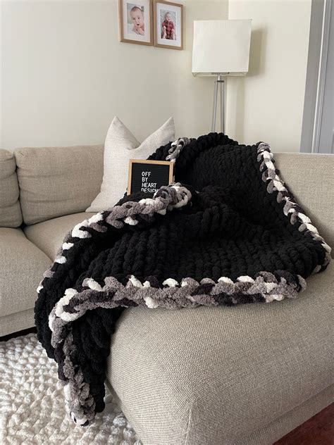 Healing Hand, Chunky Knit Blankets Black with Camo Edge in 2023 | Chunky yarn blanket, Chunky ...