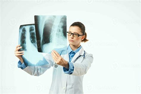 woman doctor radiologist x-rays examination hospital light background 23727026 Stock Photo at ...