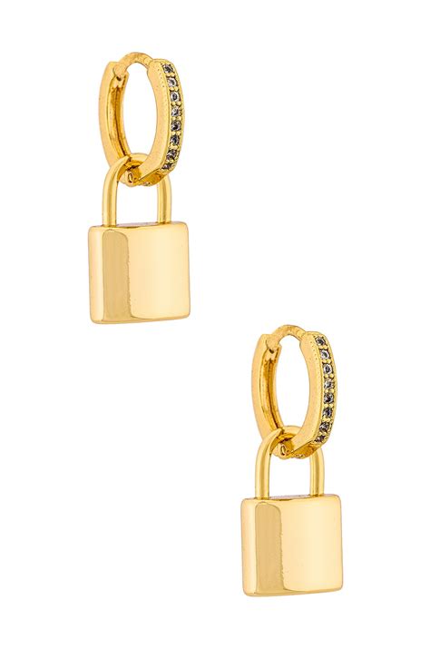 Natalie B Jewelry Leni Padlock Huggy Hoops Earring in Gold | REVOLVE