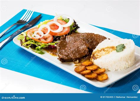 Asado Negro Venezuelan Typical Food Stock Image - Image of onion, green ...