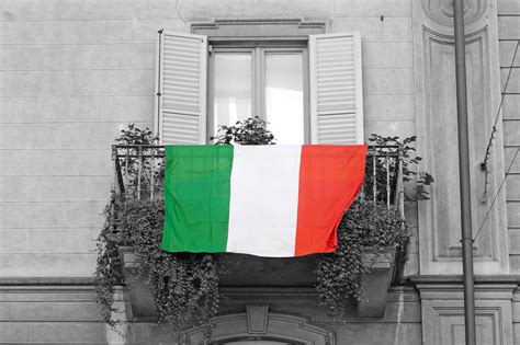 How to Hang a Flag on a Balcony: 4 Different Ways - Balcony Boss