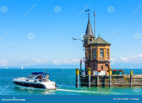 Lighthouse and Yacht in Harbor of Constance or Konstanz, Germany ...