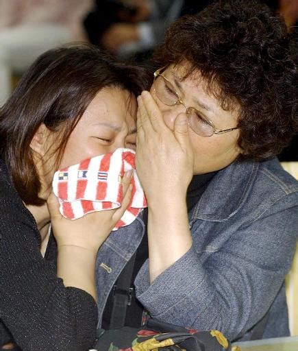 组图：国航空难遇难者上升至126人 死者已逝生者哀痛