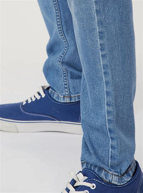 Buy Men Distressed Carrot Fit Jeans Online at just Rs. 1699.0 ...