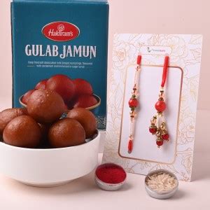 Floweraura Set Of Bhaiya Bhabhi Red Pearl Fancy Rakhi With Roli,Chawal ...