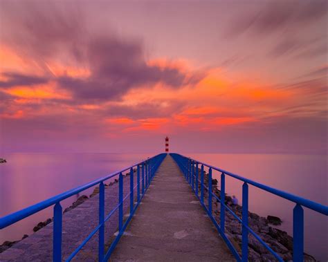Download wallpaper 1280x1024 pier, lighthouse, sea, sunset, skyline ...