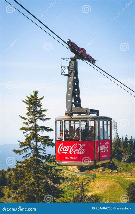 Group of People Inside a Cable Car with Coca-cola Print on it Editorial ...