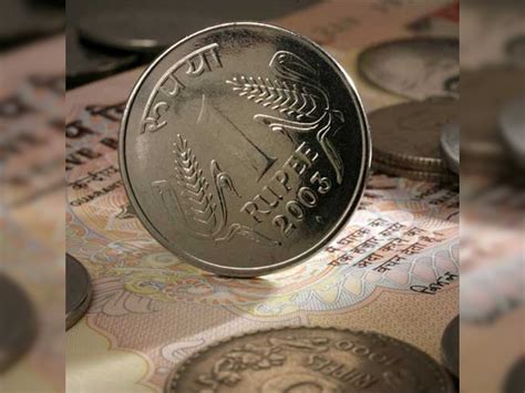 Rupee loses value by 8 paise against dollar in early trade