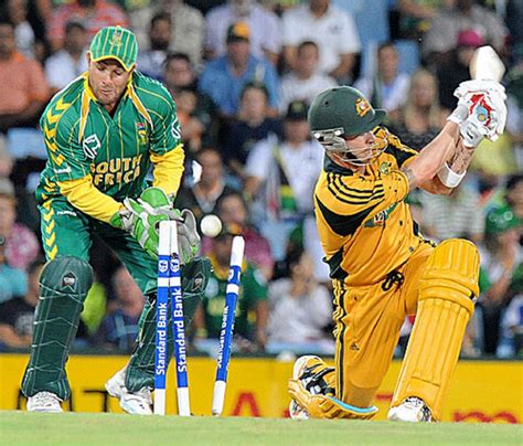 Michael Clarke sweeps and his leg stump is knocked out cold by Johan ...