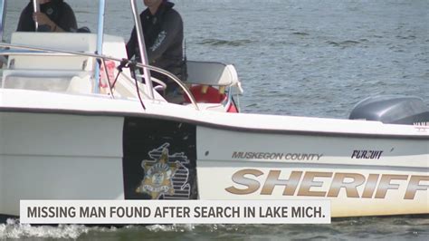 Crews recover fisherman who fell overboard into Lake Michigan | wzzm13.com