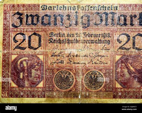 Large fragment of the obverse side of 20 twenty German marks banknote currency issued 1918 by ...