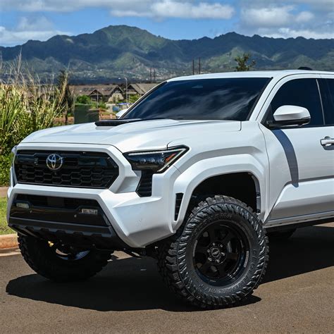 Custom N400 Toyota Tacoma Feels Ice Cap Pristine on Black 18s and Massive Geolander 35s ...