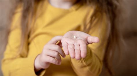 Image result for First Loose Tooth Getting Pulled Out