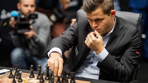 Download Magnus Carlsen Black Chess Pieces Wallpaper | Wallpapers.com
