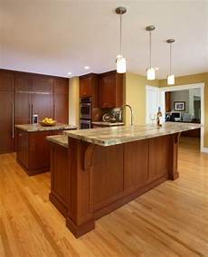 The Table That Splits The Kitchen In Two by Duo Height Island With Stove Top Not Pictured Curved The Table That Splits The Kitchen In Two