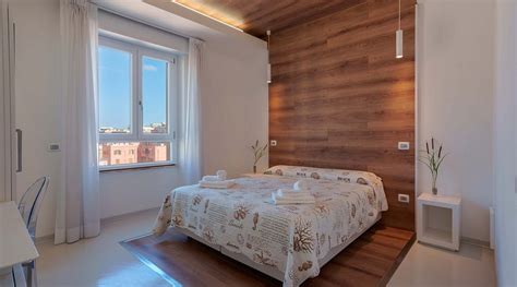 LUMIERE ROOMS - EJA SARDINIA (Cagliari) - Lodging Reviews, Photos, Rate ...