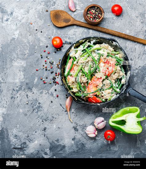 Protein scrambled eggs with asparagus beans. Fried eggs with vegetables ...