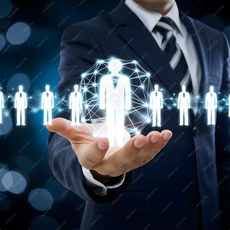 Premium Photo | Businessman uses digital interface to connect with human silhouettes Futuristic ...