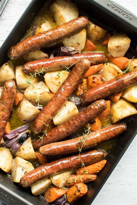 Oven baked sausages with potatoes vegetable and gravy – Artofit