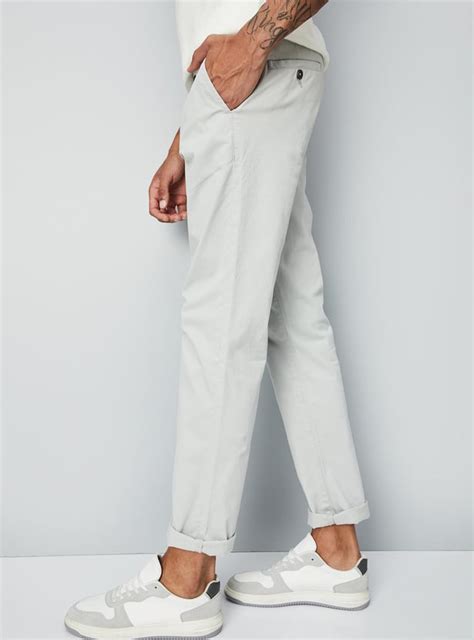 Buy Men Slim Fit Solid Stretch Chinos Online at just Rs. 899.0 ...