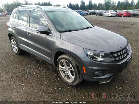 Report WVGBV7AX7CW005384 VOLKSWAGEN TIGUAN 2012 Gray Gasoline - price and damage history